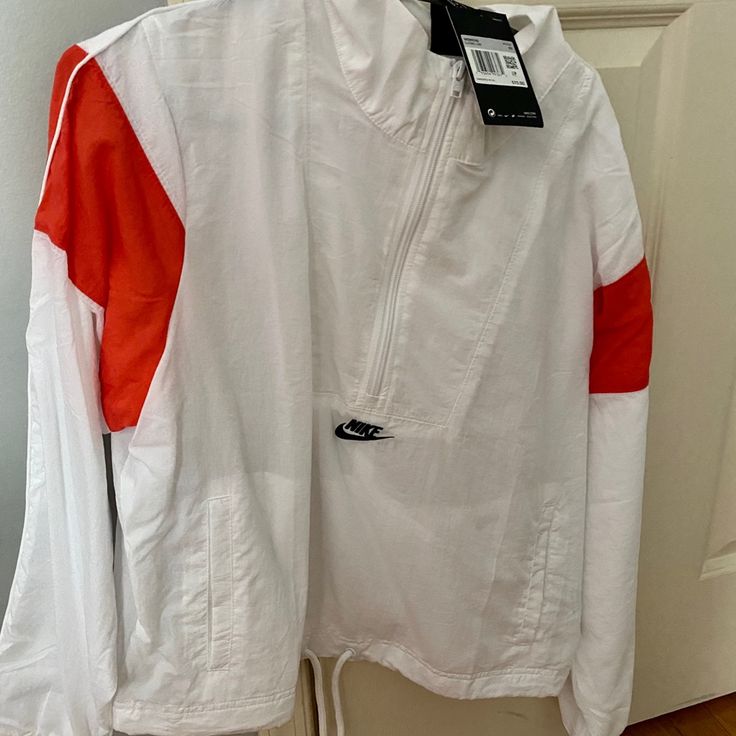 White And Orange Bike Wind Breaker (Brand New, Never Worn) Sporty White Fall Outerwear, Casual White Long Sleeve Windbreaker, White Nike Track Jacket Functional, White Sportswear Windbreaker For Sports, White Windbreaker For Sports, White Functional Windbreaker For Sports, White Athleisure Track Jacket For Fall, White Sporty Outerwear For Spring, Sporty White Spring Outerwear