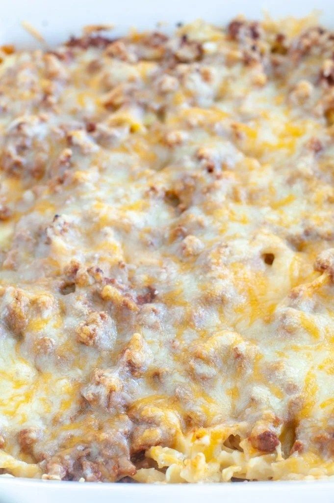 a casserole dish with meat and cheese in it is ready to be eaten