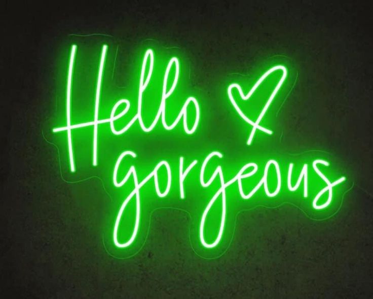 a green neon sign that says hello gorgeous