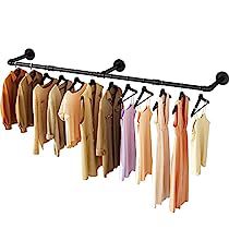 a rack with clothes hanging from it's hooks