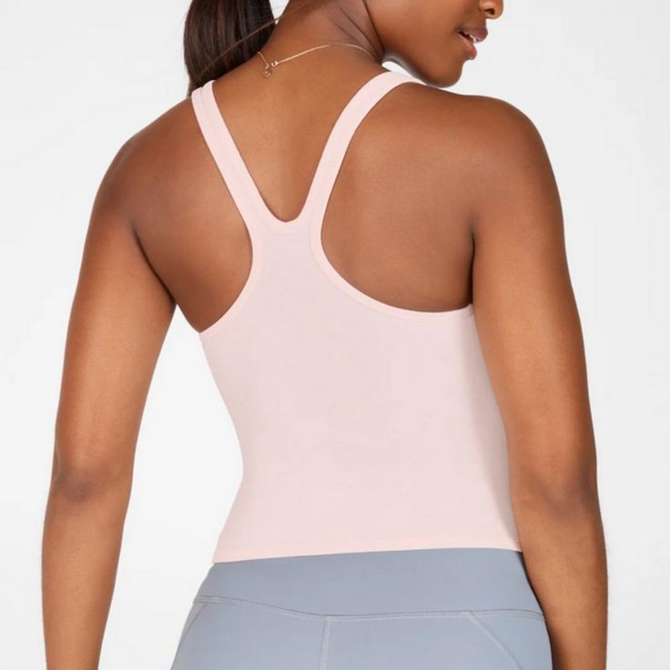 Fabletics Denise Sculptknit Tank In Pink Frost Size L Nwt $50 Removed From Bag, But Tag Is Still Attached High Stretch Seamless Pink Tank Top, Pink Snug Fit Activewear For Sports, Functional Pink Workout Tops, Pink Sleeveless Athletic Fit Activewear, Pink Go-dry Racerback Activewear, Pink Compressive Racerback Activewear, Pink Racerback Activewear With Go-dry, Pink Racerback Yoga Top, Pink Sports Bra With Seamless Construction