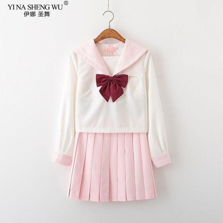 Get ready to dress up in style with this kawaii Japanese School Uniform Set! Whether you're a fan of Japanese culture, or anime, or just looking for a unique and fun outfit, this set is the perfect choice for you. The set comes in both pink and blue colors, featuring a classic Japanese school uniform design that is both stylish and comfortable to wear. The top is a collared shirt with long sleeves and the bottom is a pleated skirt that falls to knee-length, completing the look with a touch of fe Christmas Elf Outfit, School Uniform Skirts, Sailor Uniform, Elf Clothes, Sailor Suit, Japanese School, Uniform Design, Skirts Online, Pink Outfits