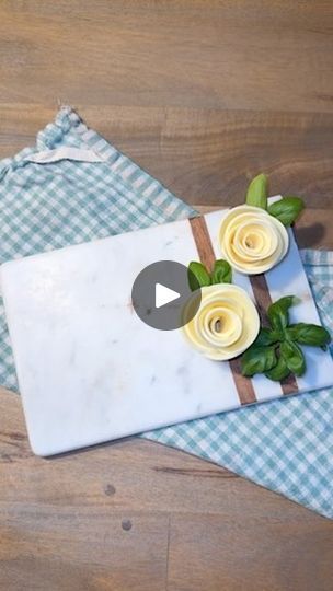 the video shows how to make paper flowers on top of napkins and placemats