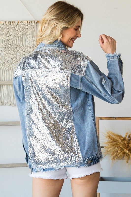 Button Up Long Sleeve Denim Jacket with sequin detail on shoulders and down back Model is 5'7" and wearing a size Small. Casual Spring Outerwear With Sequins, Trendy Spring Outerwear With Contrast Sequin, Casual Sequined Outerwear For Spring, Casual Long Sleeve Denim Jacket With Sequins, Casual Fall Outerwear With Sequins, Casual Sequined Outerwear For Fall, Spring Party Casual Denim Jacket, Denim Long Sleeve Outerwear With Sequins, Denim Long Sleeve Jacket For Night Out