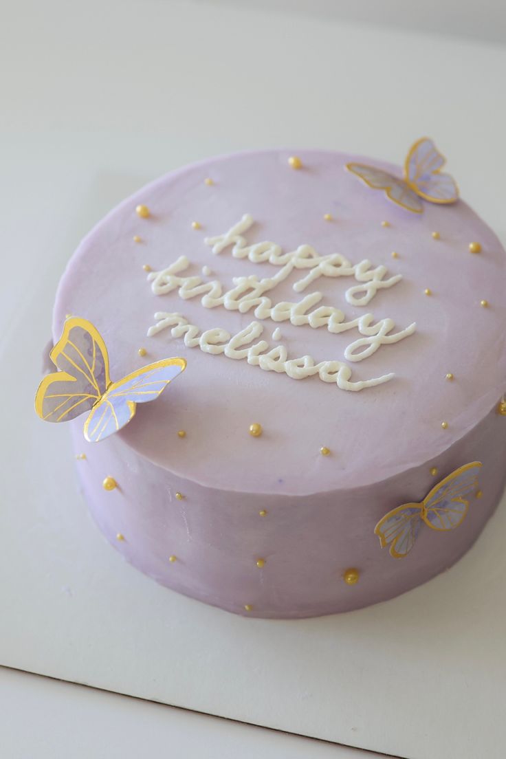 Lavender buttercream cake with gold Pearl sprinkles and paper butterflies. Very Simple Birthday Cake, Mini Butterfly Cake, Simple Butterfly Cake Designs, Butterfly Cake Ideas Birthdays Simple, Butterfly Bento Cake, Simple Pastel Cake, Simple Cute Birthday Cakes, Cute Mini Cakes Birthdays, Cute Purple Cake