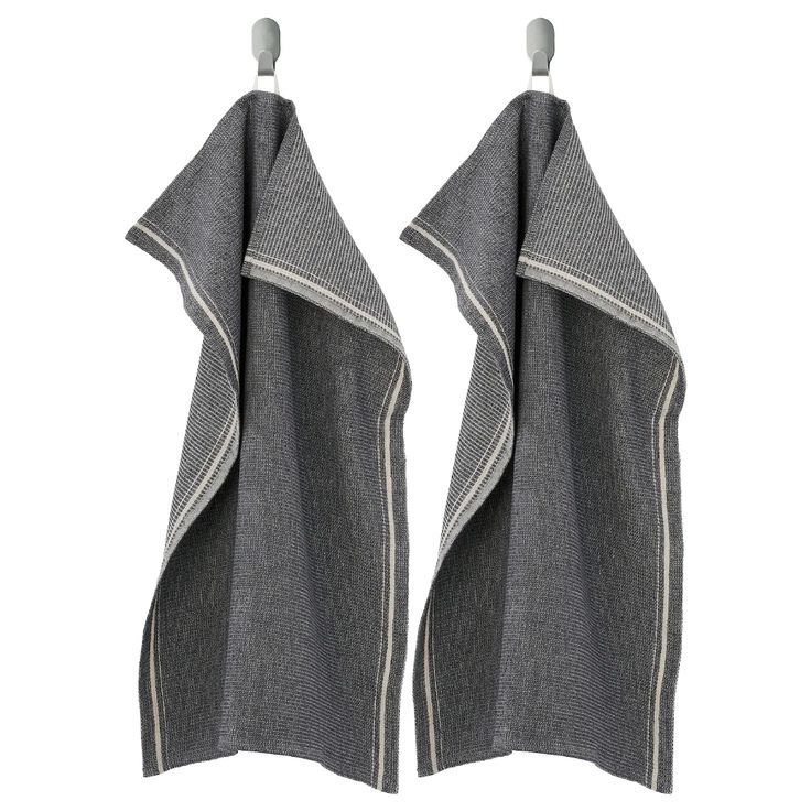 two gray towels hanging on the clothesline against a white background with clippings