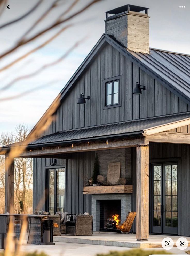 a house with a fire place in front of it