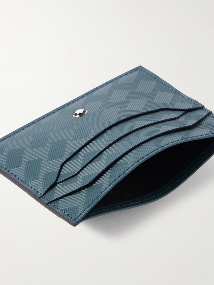 Montblanc has a long history of creating magnificent pens, but the brand is also a purveyor of sophisticated and stylishly minimal accessories. This 'Extreme 3.0' cardholder has been crafted in Italy from supple leather with a diagonal textured pattern on one side. It features six slots, plus a central compartment for folded bills. Luxury Blue Leather Card Holder, Elegant Blue Card Holder For Formal Use, Elegant Blue Card Holder For Formal Occasions, Blue Elegant Card Holder With Rfid Blocking, Elegant Blue Rfid Blocking Card Holder, Classic Blue Card Holder For Business, Classic Blue Business Card Holder, Leather Cardholder, Minimal Accessories