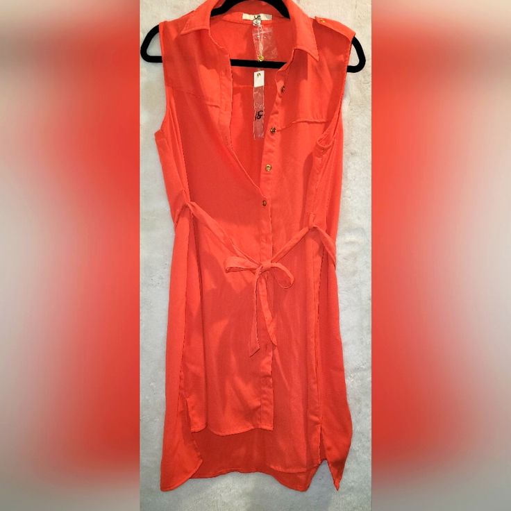 Sleeveless Shirt Dress By Ya Losangeles. Fresh, Light, And Comfortable Fabric For The Hot Days That Are Close! Orange Color, With A Shirt-Style Collar, Buttoned In The Front. Ribbon Of The Same Fabric And Color To Adjust The Waist And Mold The Garment To Your Body. Sleeveless Summer Vacation Shirt Dress, Sleeveless Shirt Dress For Summer Vacation, Chic Sleeveless Shirt Dress For Vacation, Fitted Sleeveless Cotton Shirt Dress, Sleeveless Shirt Dress For Spring Vacation, Sleeveless Shirt Dress For Summer Daywear, Sleeveless Shirt Dress For Spring Beach, Sleeveless Shirt Dress For Spring Beach Outing, Sleeveless Shirt Dress For Beach In Spring