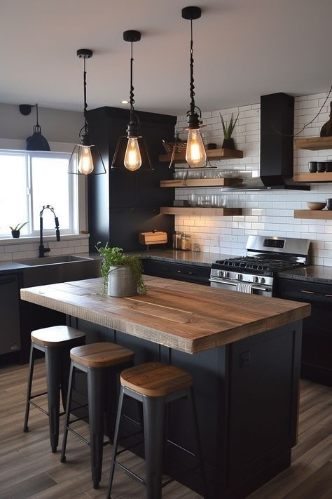 a kitchen with black cabinets and wooden counter tops, two stools in front of the island