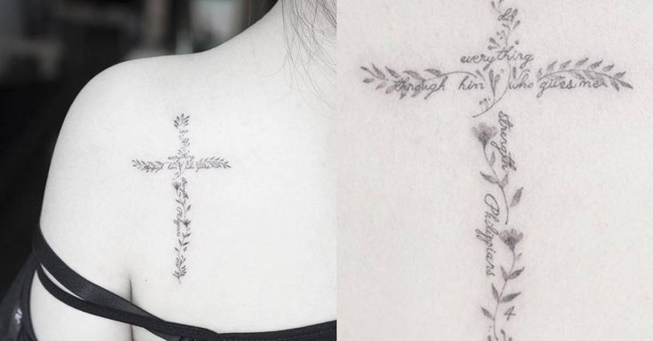 a cross tattoo on the back of a woman's shoulder