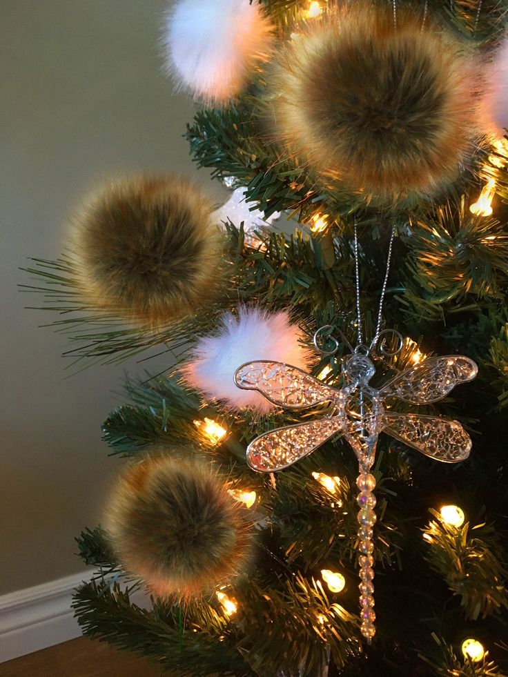 a christmas tree decorated with lights and ornaments