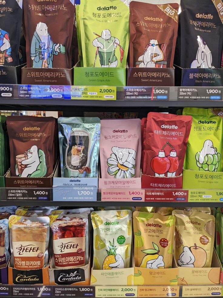 many bags of coffee on display in a store