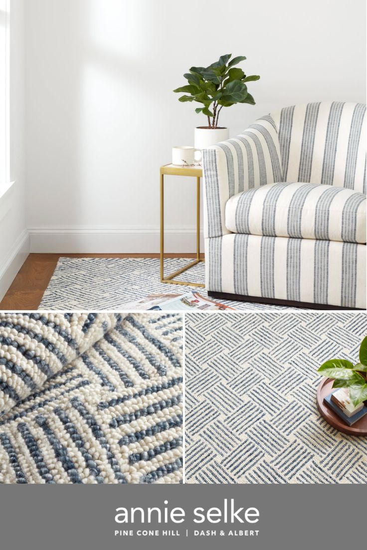 a living room with white walls and blue rugs on the floor next to a chair