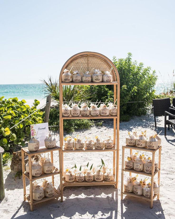 there are many small pots on the stand