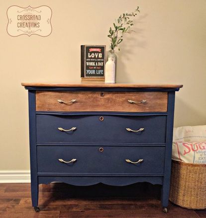 an old dresser painted blue and brown