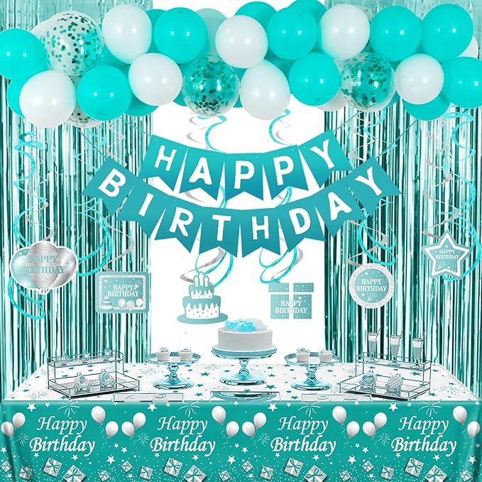 a birthday party with blue and white balloons