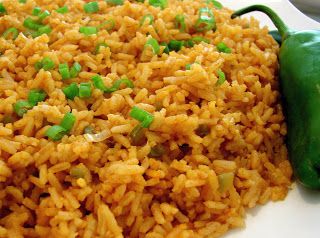 rice and green peppers on a white plate