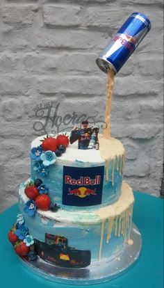 a birthday cake with a beer can on top