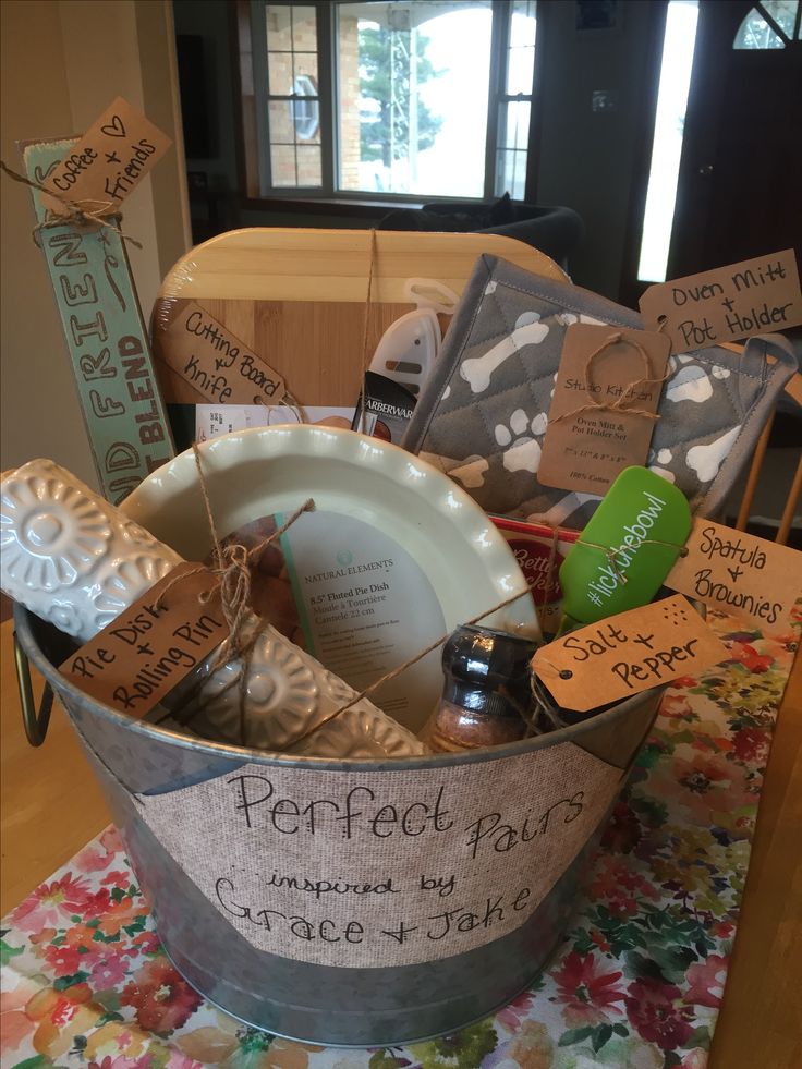 a bucket filled with personal care items on top of a table