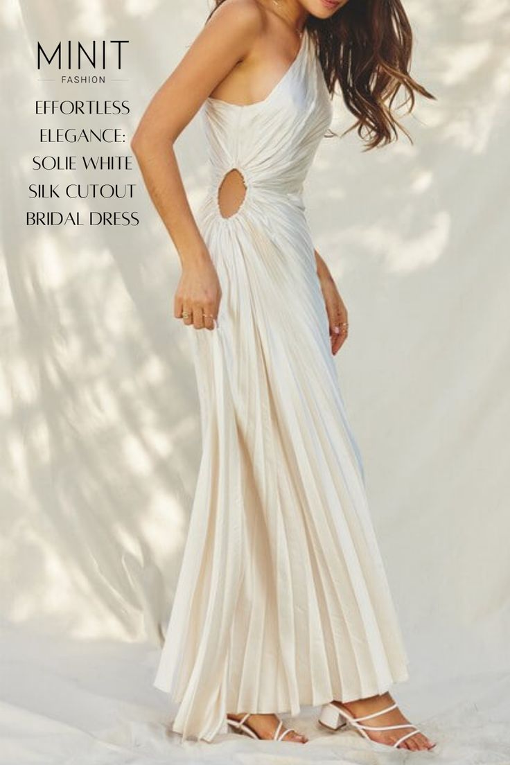 a woman in a white dress is posing for the cover of a magazine with her hands on her hips