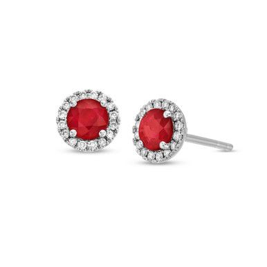 Command attention with our white gold stud earrings, highlighting vibrant rubies encircled by halos of sparkling diamonds. Statements are made with these luxurious earrings. Red Halo Setting Earrings For Formal Occasions, Classic Red Earrings With Halo Setting, Red Ruby Earrings With Halo Setting, Classic Ruby Earrings With Halo Setting, White Gold Ruby Earrings With Halo Design, Ruby Halo Setting Earrings In Fine Jewelry, Ruby Halo Setting Earrings Fine Jewelry, Ruby Halo Earrings In Fine Jewelry Style, Red Round Halo Design Earrings