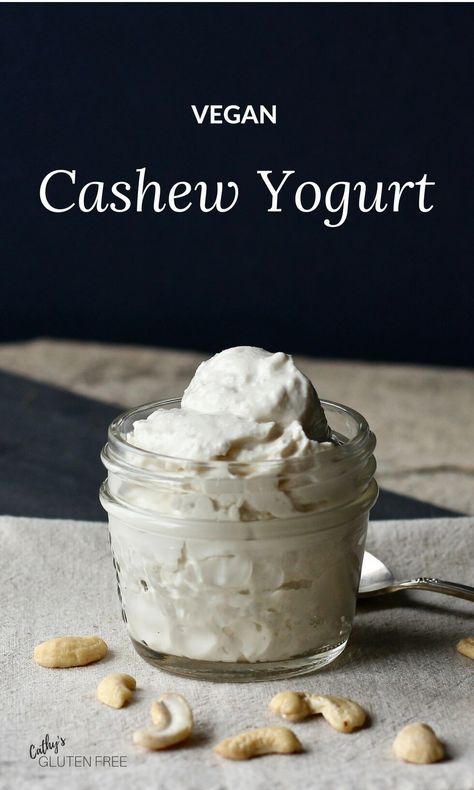 vegan cashew yogurt in a glass jar on a table with peanuts