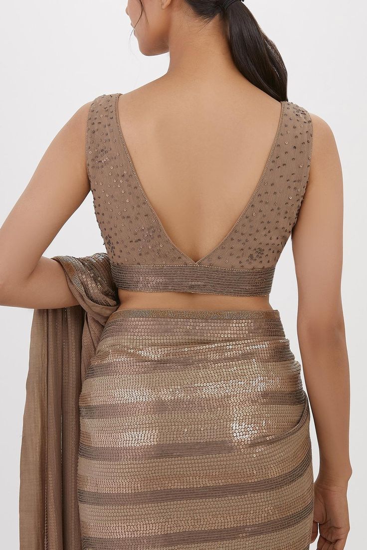 Buy Nakul Sen Grey Chiffon Stripe Pattern Saree With Sleeveless Blouse Online | Aza Fashions Lehriya Blouse Designs Latest, Lehnga Blouse Designs Sleeveless, Blouse Designs For Sequin Saree, Trendy Blouse Designs Sleeveless, Sleeveless V Neck Blouse Designs, V Neck Blouse Designs Saree, V Shape Blouse Designs Latest, V Neck Sleeveless Saree Blouse, Back V Neck Blouse Design