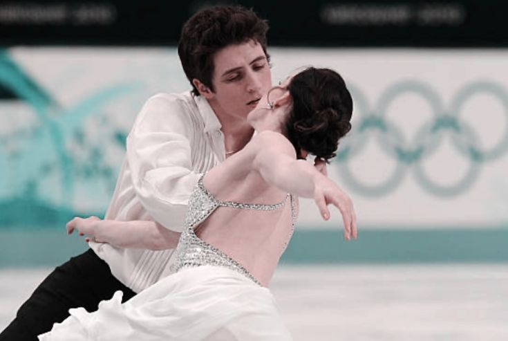 two figure skaters performing in the ice dance competition at the vancouver winter olympics on march 28, 2013