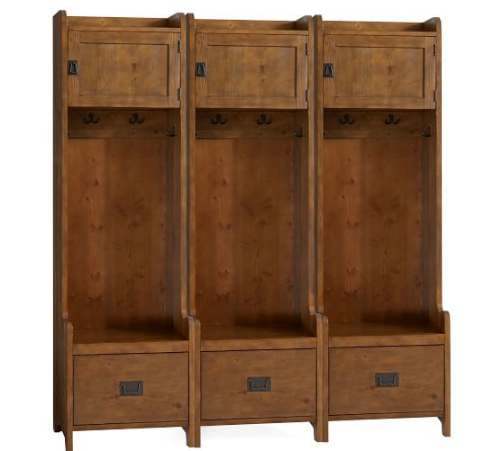 three wooden shelves with drawers on each side