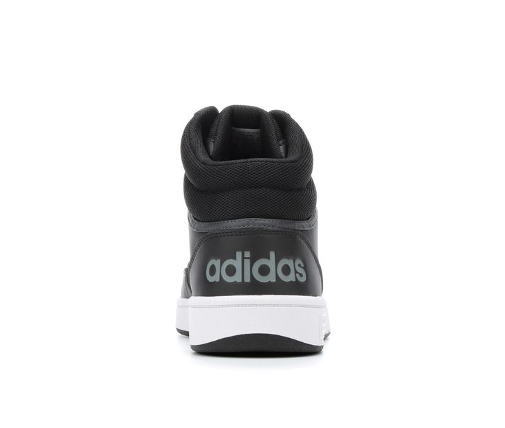 Combination leather and synthetic upper, Mid-top design with padded collar and fabric lining, Lace-up closure for a custom fit, Classic round toe with stitching details, Absorbent fabric lined insole, Durable rubber midsole and outsole with traction pattern, adidas® iconic three stripe details and branding | Men's Adidas Hoops 3.0 Mid Sneakers in Black/WHITE Size 9.5 Medium