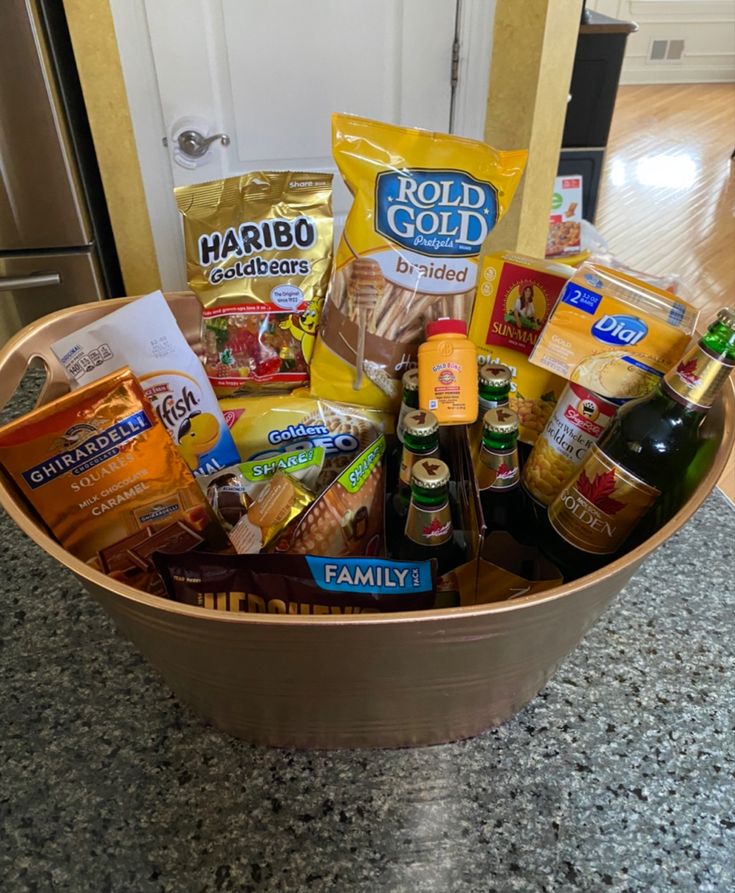 a basket filled with lots of food on top of a counter