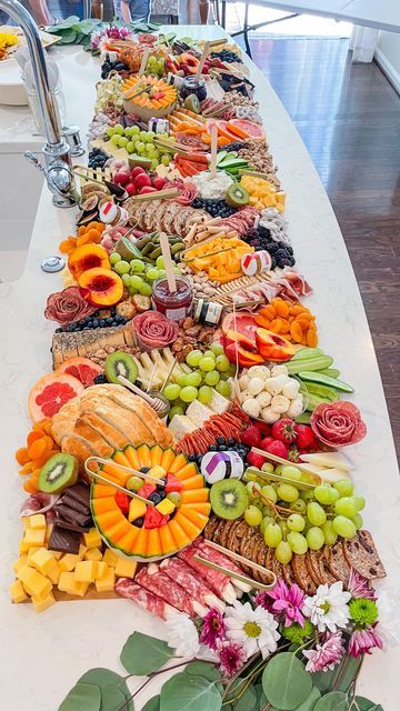 a long table filled with lots of different types of food