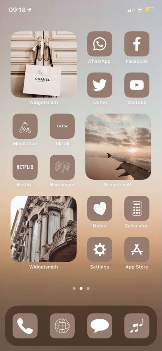 an iphone screen showing the home page and icons for different things in the world on it