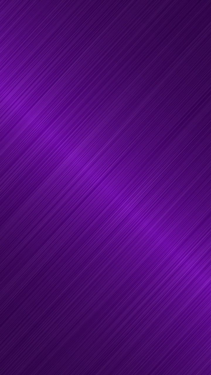 a purple background that is very shiny and has been used as a wallpaper or backdrop