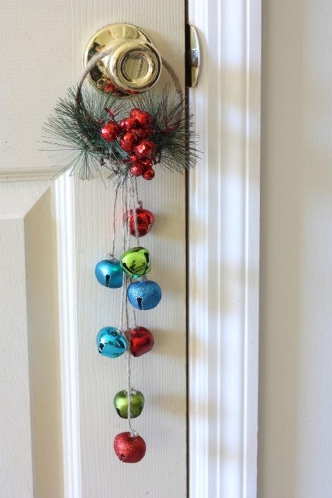 a door handle with ornaments hanging from it