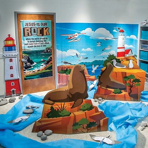 there is a display in the children's room with animals and lighthouses on it