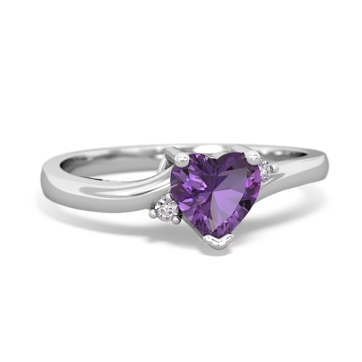 Delicate and dainty, this 14K White Gold ring is a lovely way to express the love within you. A heart shaped deep purple amethyst is the focus of this ring, with two sparkling diamonds. It creates an elegant look that is not overstated, and is beautiful on the hand. It is perfect as an everyday ring and an excellent choice for a promise ring as well. Heart Cut Amethyst Ring With Accent Stones, Elegant Heart-shaped Amethyst Ring, Heart-shaped Amethyst Wedding Ring, Fine Jewelry Amethyst Heart Cut Birthstone Ring, Heart Shaped Amethyst Ring For Wedding, Heart Cut Amethyst Birthstone Ring Fine Jewelry, Heart-shaped Amethyst Ring For Wedding, Fine Jewelry, Heart-shaped Amethyst Wedding Ring In Fine Jewelry Style, Valentine's Day Purple Amethyst Promise Ring