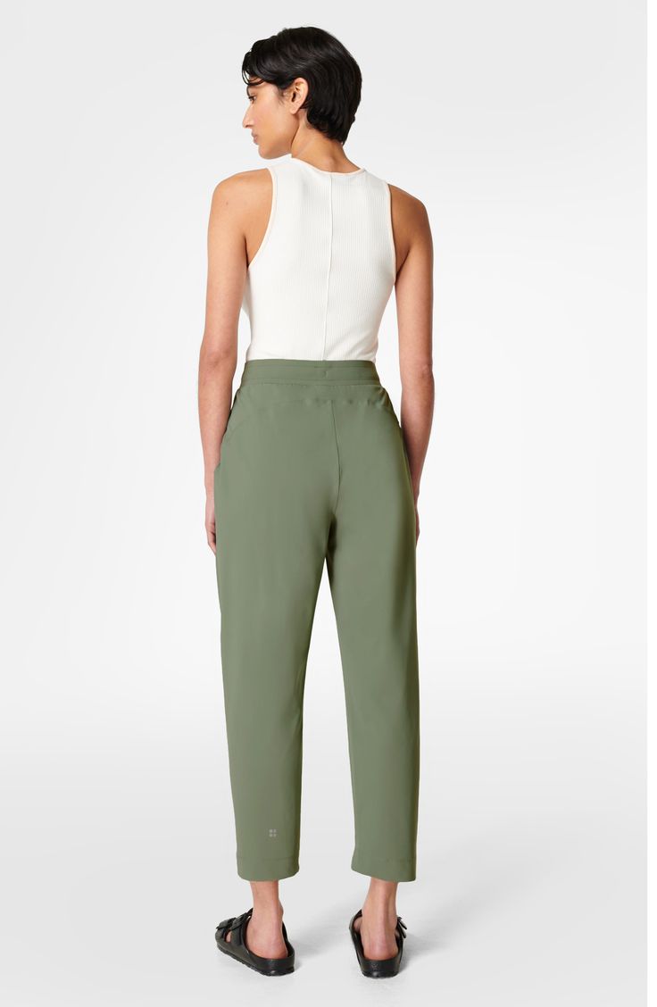 Stay in, work out and make an easy-breezy transition to leisure time in tapered athletic pants made from stretchy, lightweight fabric. 25" inseam; 13" leg opening; 12 1/2" front rise; 16" back rise (size Medium). Elastic/drawstring waist Front slant pockets 71% polyamide, 29% elastane Machine wash, dry flat Made in Turkey Women's Clothing Workout Pants With 4-way Stretch And Tapered Leg, Workout Tapered Leg Pants With 4-way Stretch, Spring Tapered Leg Joggers With Comfort Waistband, Sporty Ankle-length Pull-on Sweatpants, Versatile Tapered Leg Sweatpants, Versatile Tapered Leg Pull-on Sweatpants, Spring Sports Bottoms With Tapered Leg, Spring Activewear With Elastic Side Panels, Athleisure Straight Leg Joggers For Workwear