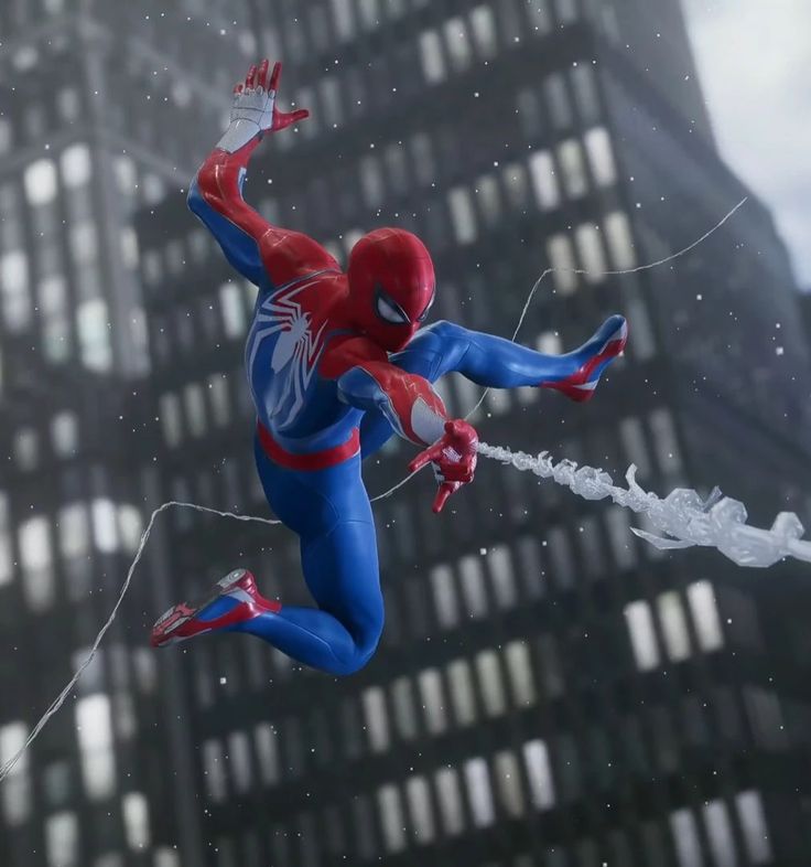 a spider man flying through the air in front of a tall building