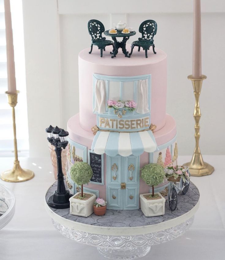 a three tiered cake is decorated with miniature furniture and decorating on the outside