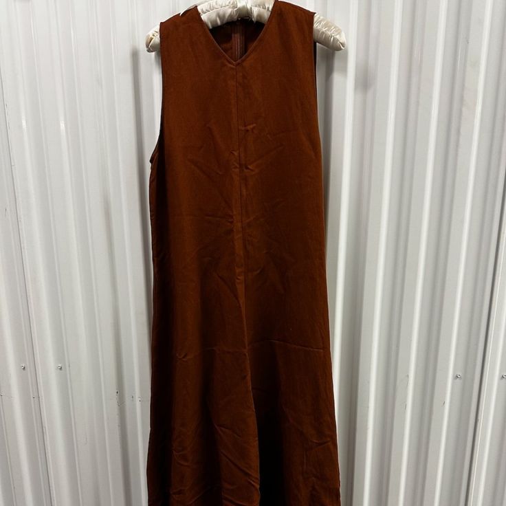 Beautiful Russet Color Linen Dress With Flair Bottom. Brand New. Runs Small. Zara A-line Maxi Dress For Fall, Zara A-line Maxi Dress For Daywear, Sleeveless Brown Maxi Dress For Fall, Casual Brown Sleeveless Maxi Dress, Brown Sleeveless Midi Dress For Daywear, Casual Brown A-line Maxi Dress, Sleeveless Brown Midi Dress For Daywear, Sleeveless Fall Beach Maxi Dress, Sleeveless Zara Maxi Dress For Fall