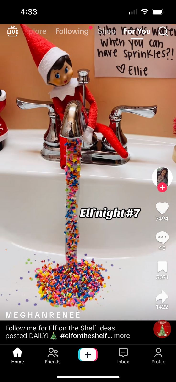 an elf is washing his hands in the sink with sprinkles on it