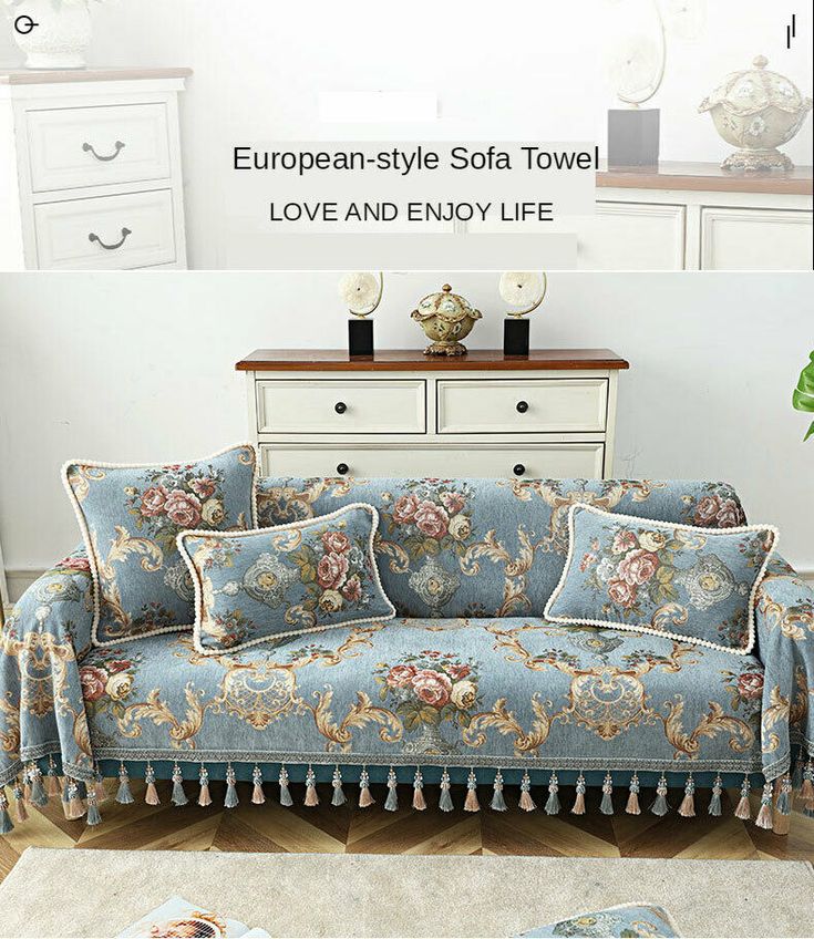 an image of a living room setting with flowers on the couch and love and enjoy life