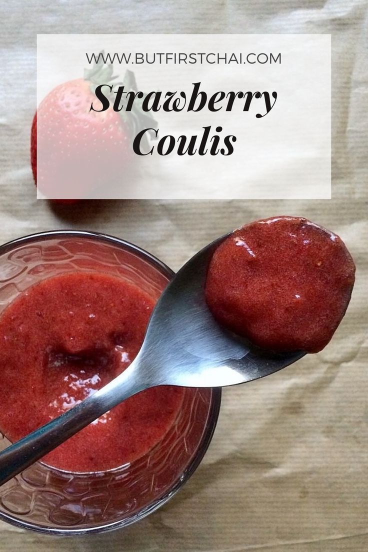 two spoons with strawberry coughberry coulits in them on top of a table