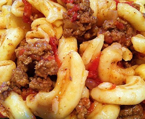 pasta with meat and sauce in a bowl