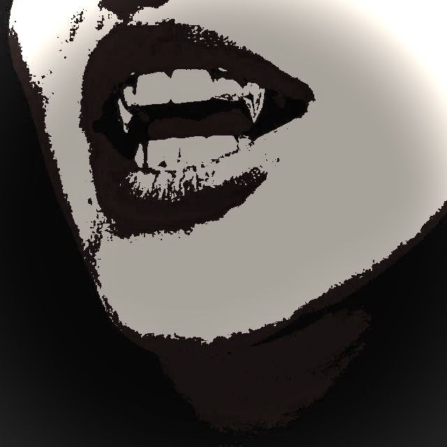 a woman's mouth is open with her tongue out and it appears to be painted black and white