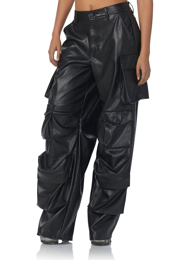 The clean lines of the wide-leg Maxwell cargo pants are enhanced by a high-waist design. Street style pocket details and a relaxed fit make her your new go-to pants. She comes in noir faux leather. Style Tip: Pair her with a Zadie for a complete look. Noir Faux leather High rise Wide wide leg Relaxed fit Cargo pocket d Black Faux Leather Cargo Pants, Leather Cargo Pants With Side Pockets For Work, Black Leather Bottoms With Cargo Pockets, Black Utility Leather Pants For Streetwear, Black Leather Cargo Pants With Cargo Pockets, Black Faux Leather Cargo Pants With Pockets, Leather Cargo Pants For Work, Edgy Cargo Pants For Work, Casual Faux Leather Cargo Pants For Streetwear