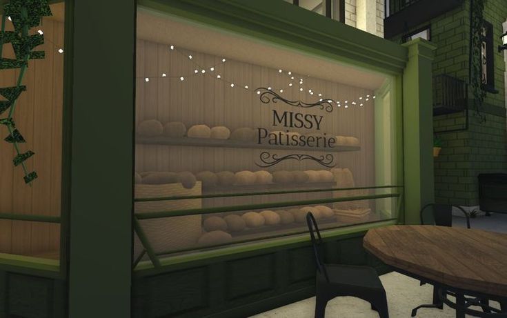 a table and chairs are in front of a glass wall with the words missy pallissing on it