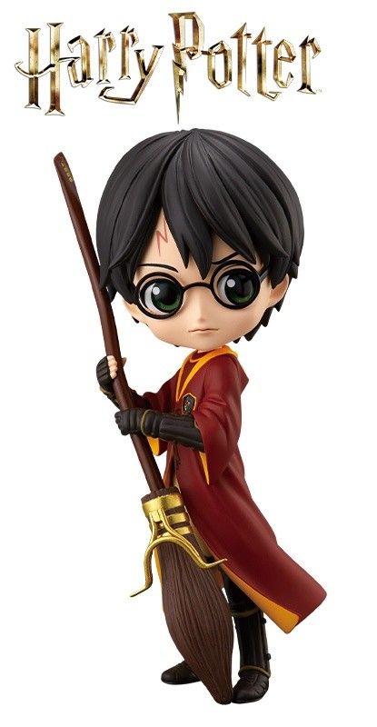 a harry potter figurine holding a broom and wearing glasses with the words harry potter on